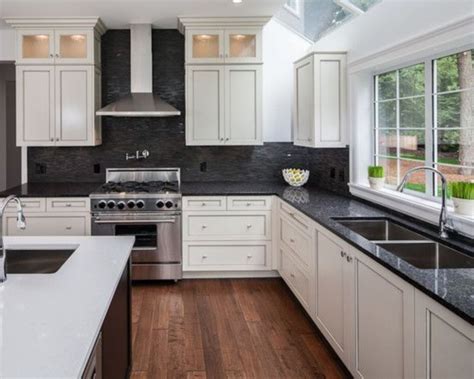 black countertops with white cabinets stainless steel backspash|black cabinets white marble countertops.